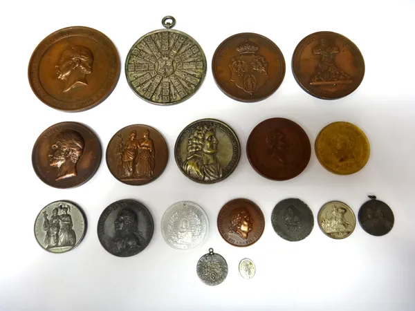 A group of eighteen mostly Polish related bronze and other base metal commemorative medallions and other items, (18).