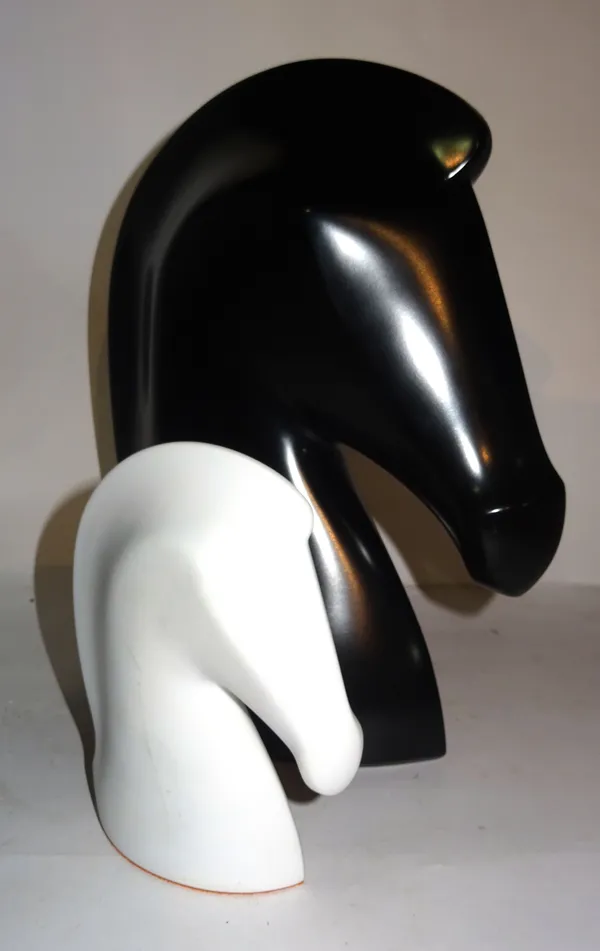 Hermes; a large black resin horse head, 32cm and a porcelain paperweight formed as a horse head, 20cm high, (2).   CAB