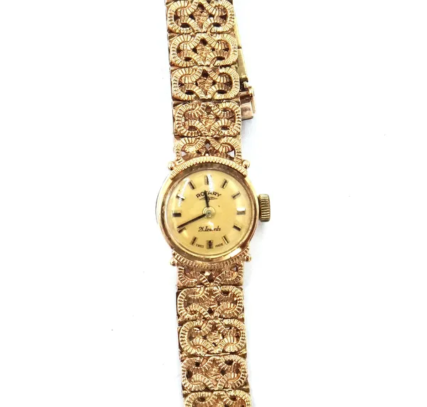 A Rotary 9ct gold lady's bracelet wristwatch, the signed circuclar matt gilt dial with black hands and with baton numerals, otherwise with a textured