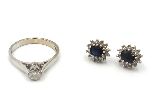 An 18ct white gold and diamond single stone ring, claw set with a circular cut diamond, London 1981, ring size J and a half and a pair of 9ct gold, sa