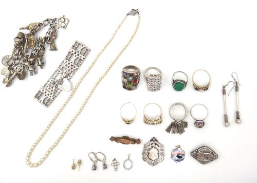 A 9ct gold, opal and garnet three stone ring, a 9ct gold, garnet three stone and colourless gem set ring, a gold, sapphire and diamond cluster ring, f