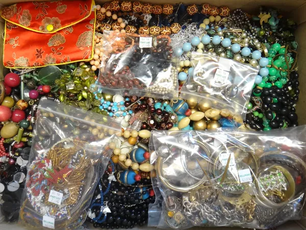 A large collection of costume jewellery, including bead and other necklaces, bead work items, bangles, rings, bracelets, pendants, chains and further