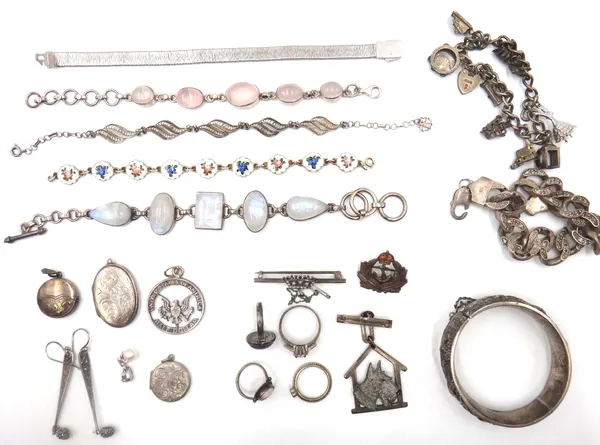 Mostly silver jewellery, comprising; a charm bracelet, an enamelled bracelet, having floral decoration, five further bracelets, a hinged bangle, four