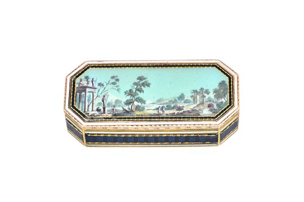 An enamelled gold modern cut cornered rectangular hinge lidded box, the lid decorated with a landscape scene, with classical style ruins and trees, in