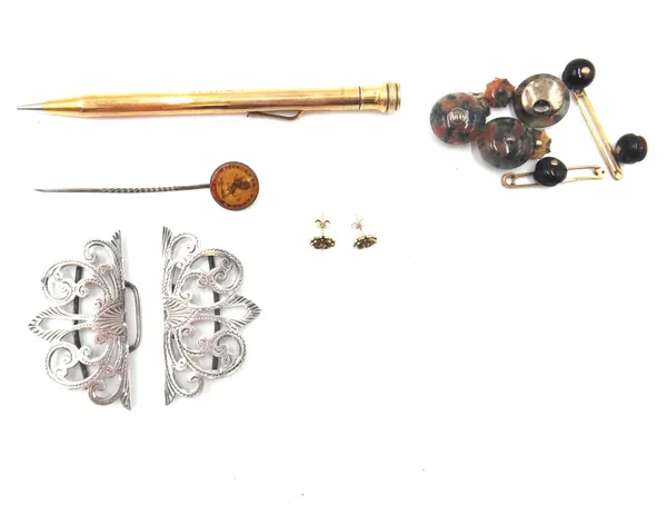 Two gold plain bar brooches, each detailed 9 CT, a stick pin with a crest terminal, a set of three moss agate circular dress studs, a set of three sha