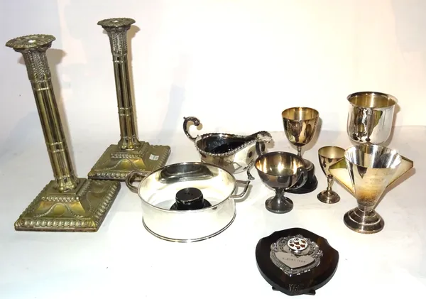 Silver plated wares, including; flatware, trophy cups, a pair of candlesticks and sundry, (qty).  S4M