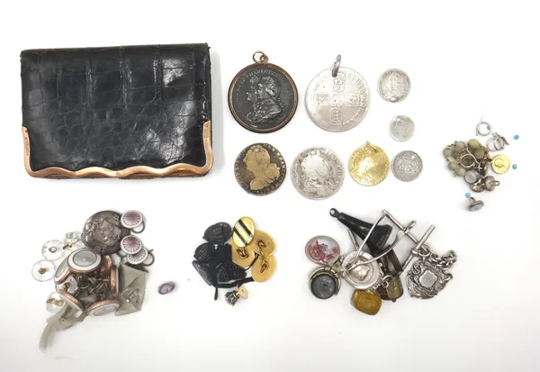 A 9ct gold mounted leather wallet, import mark Birmingham 1903, eight coins and medallions, mostly drilled with holes or otherwise mounted as jeweller