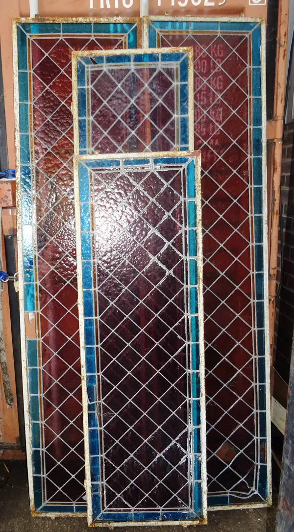 Four Circa 1900 red and blue stained glass leaded windows, two measure 45cm wide x 215cm long, one 49cm wide x 204cm long and the last 52cm wide x 161