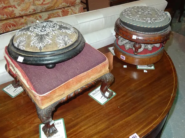 A Victorian mahogany footstool on ball and claw feet 36cm wide x 23cm high, together with a group of three various circular bead work footstools, (4).