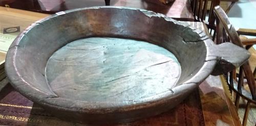 A large rustic sycamore single handled bowl, 60cm wide.  BAY 1