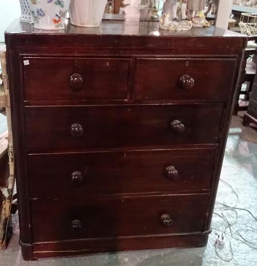 A Victorian mahogany chest of two short and three long graduated drawers with turned handles and plinth base, 106cm wide.   BAY 2