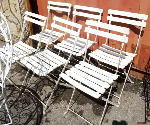 A set of six early 20th century French white metal folding cafe chairs, (6).   OUT