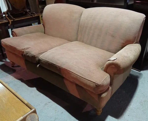 A 20th century oak framed two seater sofa, with brown upholstery, 185cm wide.  J4