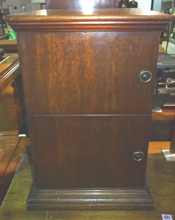 A early 20th century mahogany bedside cupboard on plinth base, 41cm wide x 61cm high.   I5