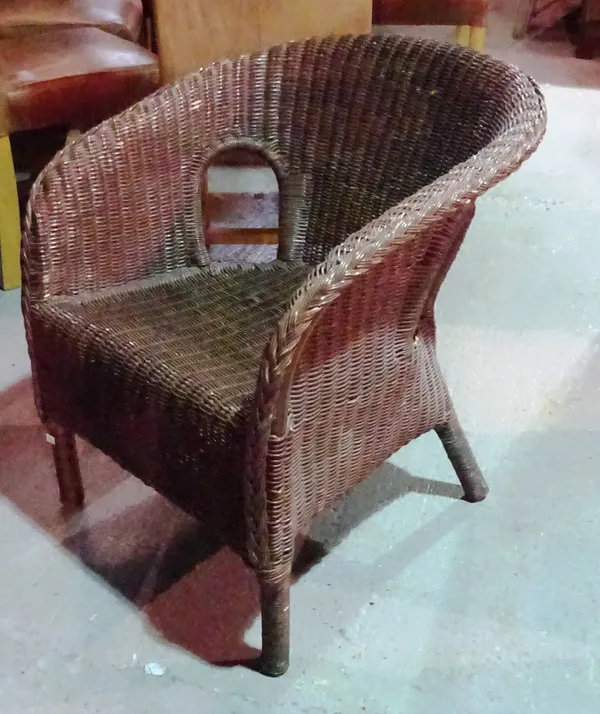 A set of four 20th century rattan garden chairs. (4)   L7