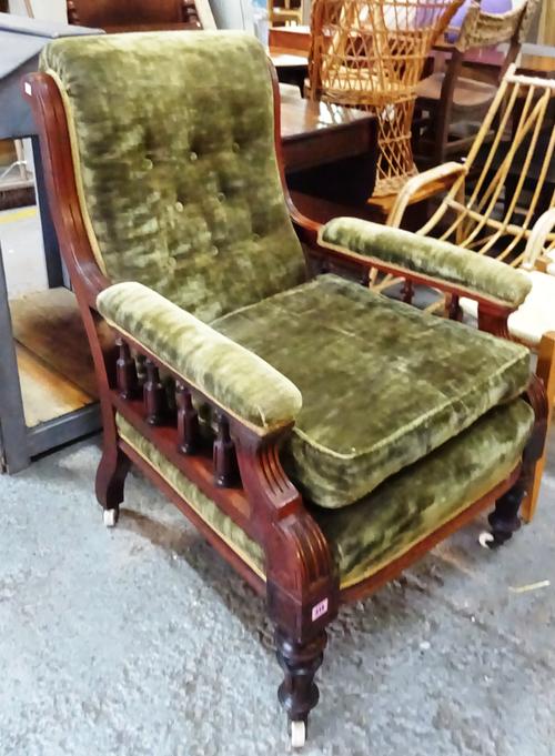 A Victorian mahogany framed armchair, on fluted tapering supports, 64cm wide.  EXTRA