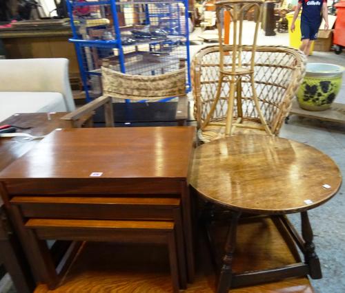 A 20th century mahogany nest of three tables, 60cm wide x 46cm high, a 20th century oak circular occasional table, 56cm wide x 40cm high, an early 20t