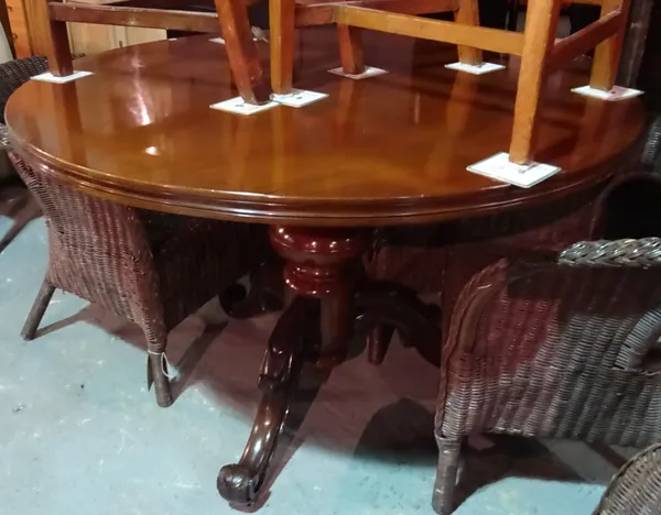 A Victorian mahogany circular snap top dining table, on three downswept supports, 127cm wide x 78cm high.  L7