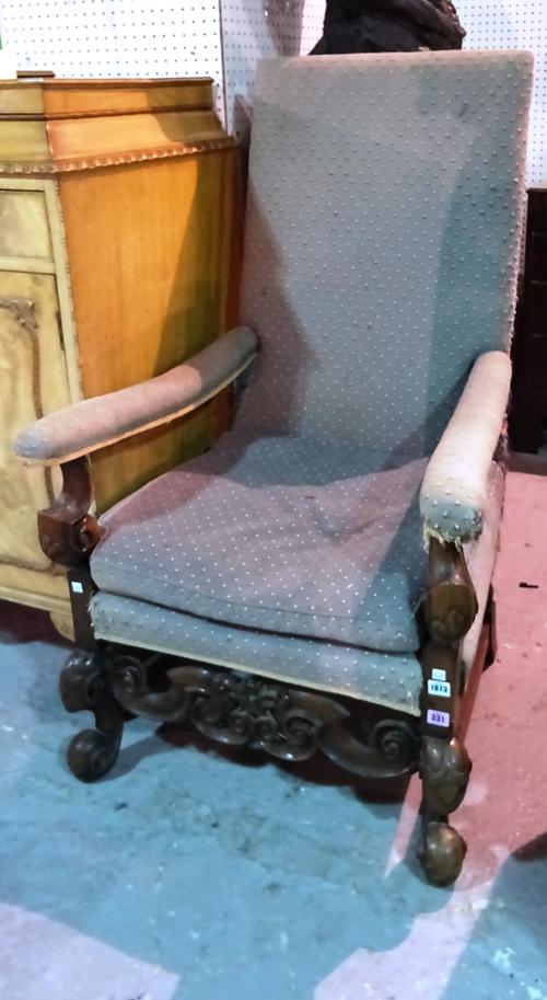 A 19th century Continental walnut framed open armchair, with pierced and carved frieze, on scroll supports, 73cm wide x 119cm high.  B6