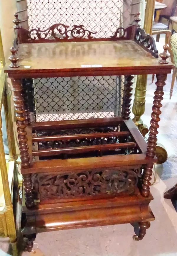 A Victorian rosewood Canterbury whatnot, with fret pierced decoration and barleytwist supports, on a single drawer base, 56cm wide x 98cm high x 40cm