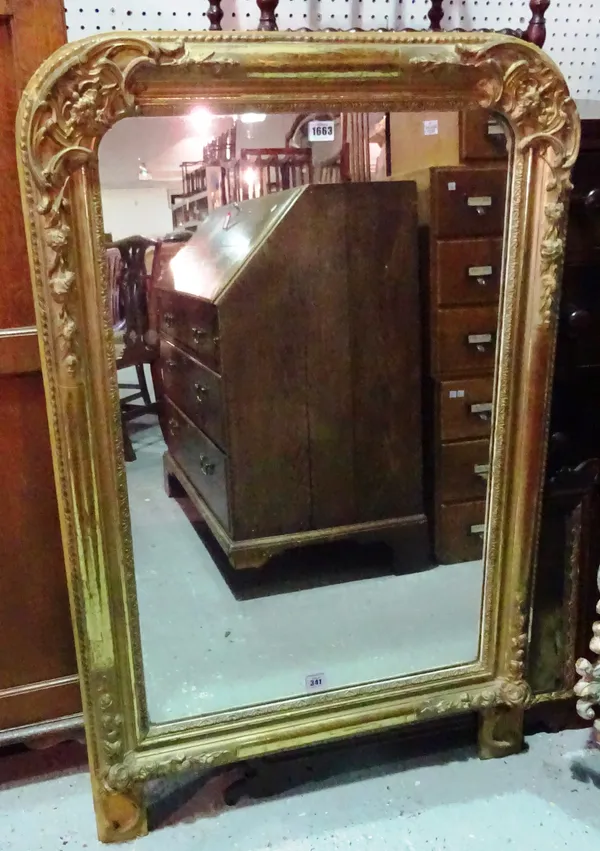 A late 19th century French gilt framed arch top mirror, with floral carved frame, 72cm wide x 114cm high.  MIRR