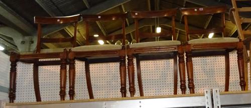 A set of four George IV mahogany dining chairs with carved top rails, reeded mid bars, drop in seats and turned legs, (4).  BAY 1