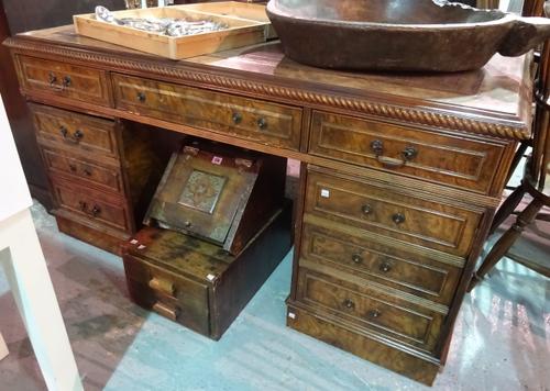 A 20th century pollard oak pedestal desk, with three frieze drawers over six dummy pedestal drawers, 153cm wide x 92cm deep x 79cm high.  BAY 1
