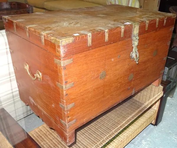 A 19th century teak campaign style brass bound trunk, 83cm wide x 50cm high.  J8