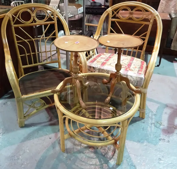 A pair of small tripod tables, pair of bamboo conservatory chairs and a bamboo framed glass topped circular table (5).  C3