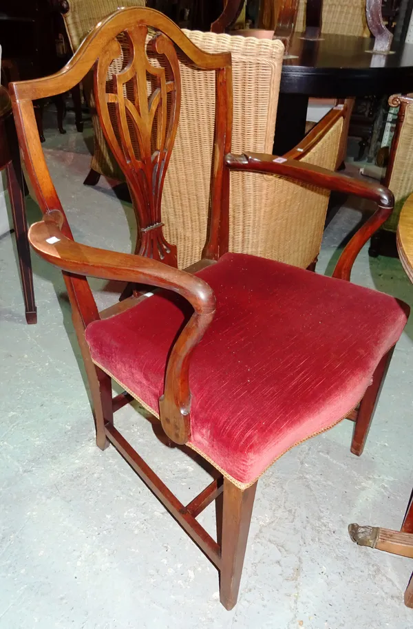 A set of six George III style mahogany dining chairs, with pierced splats and tapering supports, (6).   D7
