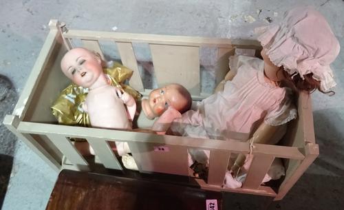 A group of vintage dolls and accessories.   BAY 2