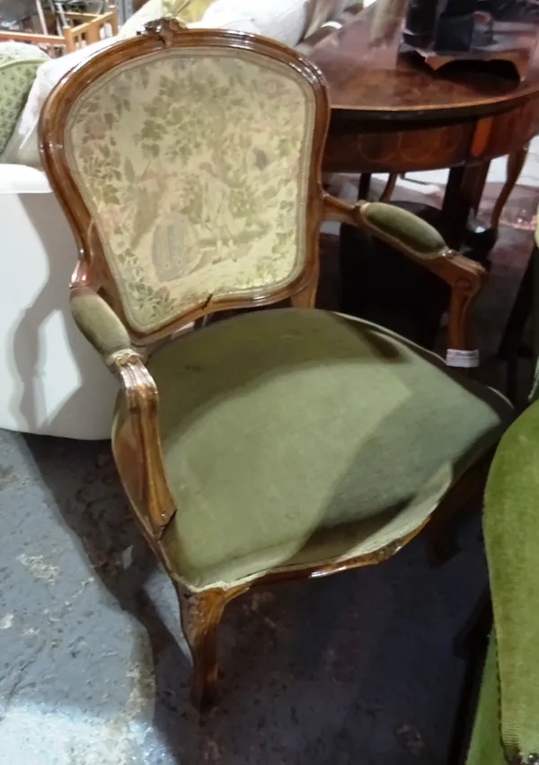 A pair of Louis XV style stained beech open armchairs with serpentine seat on scroll support, 63cm wide x 92cm high (2).  BAY 2