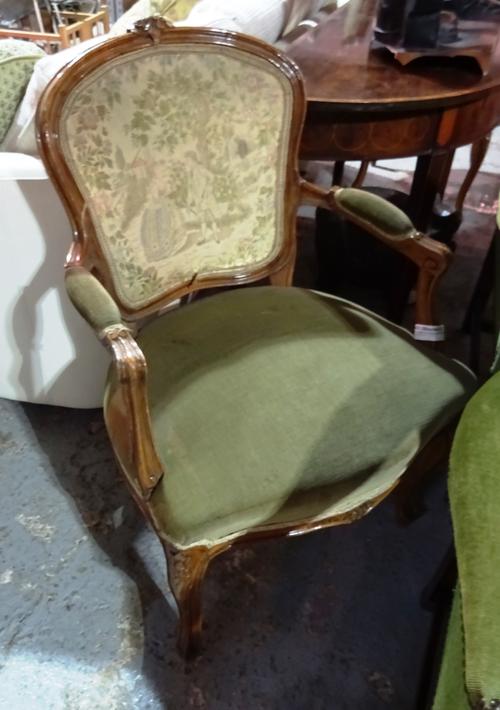 A pair of Louis XV style stained beech open armchairs with serpentine seat on scroll support, 63cm wide x 92cm high (2).  BAY 2