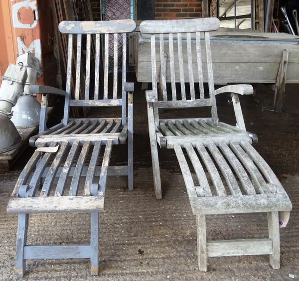 Two 20th century slatted hardwood steamer style chairs (2).  OUT