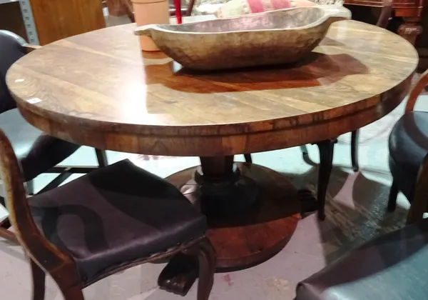 A Regency rosewood snap top breakfast table on octagonal tapering column, 126cm wide x 80cm high.   BAY 1