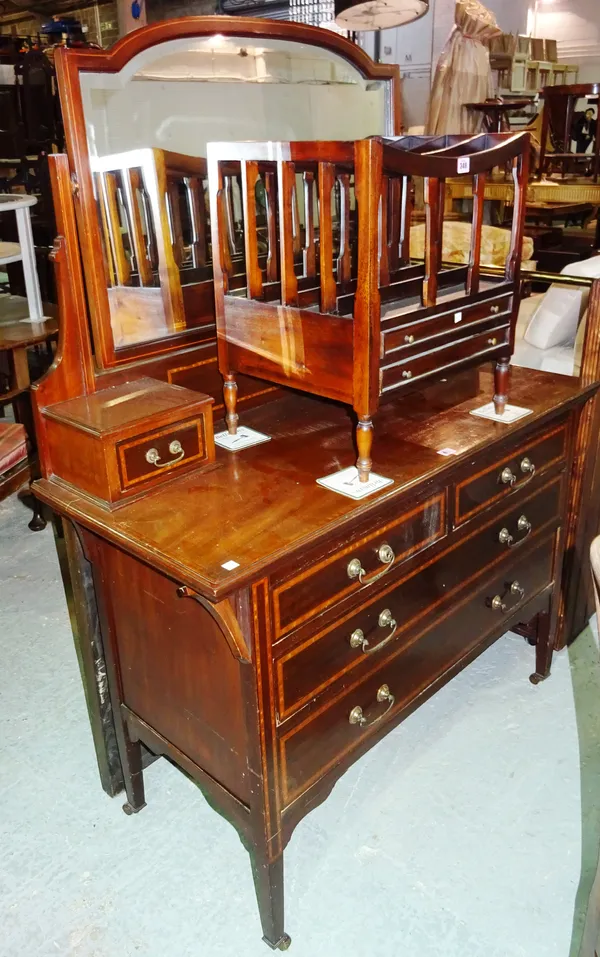 An Edwardian inlaid mahogany dressing table with two short and two long drawers on tapering square supports, 115cm wide x 155cm high.   E8