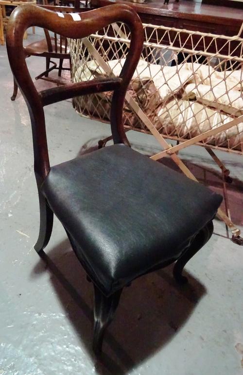 A set of four Victorian mahogany balloon back dining chairs on cabriole supports and a pair of 20th century oak open armchairs with black leather upho
