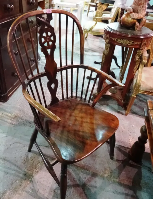 A pair of 19th century style ash and elm wheel back Windsor chairs on turned supports, 54cm wide x 99cm high (2).  H4