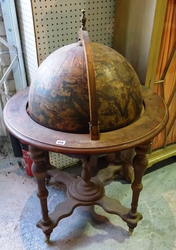 An early 20th century drinks cabinet formed as a globe, 67cm wide x 100cm high.   A8