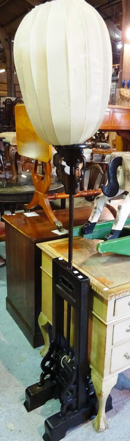 A pair of 20th century Chinese hardwood adjustable candle stands converted into standing lamps, 25cm wide x 130cm high (2).  C8