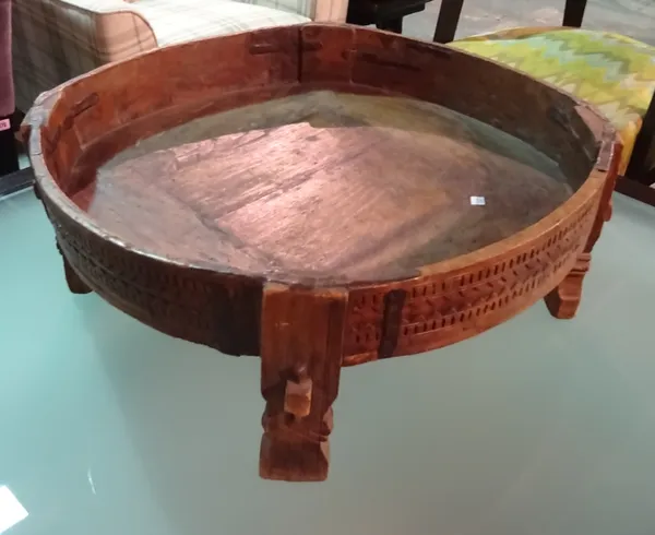 An early 20th century African hardwood and wrought iron circular brazier, 72cm wide x 28cm high.  J8
