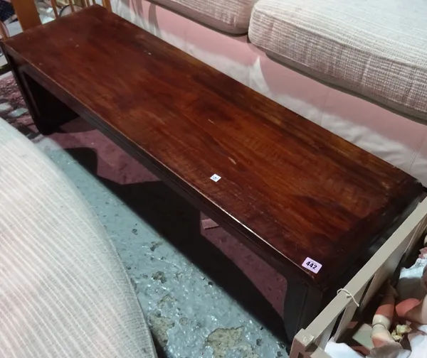 A 20th century hardwood Chinese bench on dual end supports, 127cm wide x 36cm high.  BAY 2