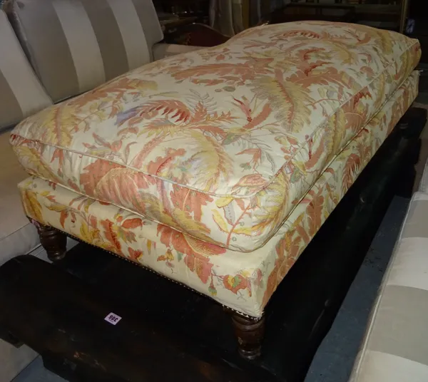 A 19th century large rectangular footstool on ring turned supports, 146cm wide x 40cm high.   F7