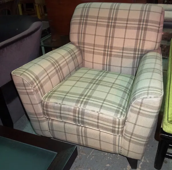 A 20th century grey check upholstered armchair on tapering square supports.  J8