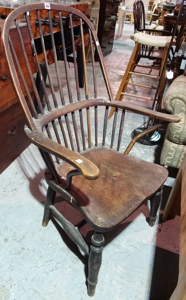 A 19th century ash and elm stick back Windsor chair, on turned supports, 64cm x 105cm high. Provenance; Property from Prudence and the late Marius Gor