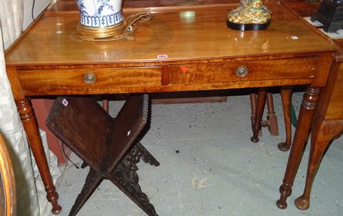 An early Victorian mahogany two drawer writing table on turned supports, 106cm wide x 76cm high x 49cm deep.   H6