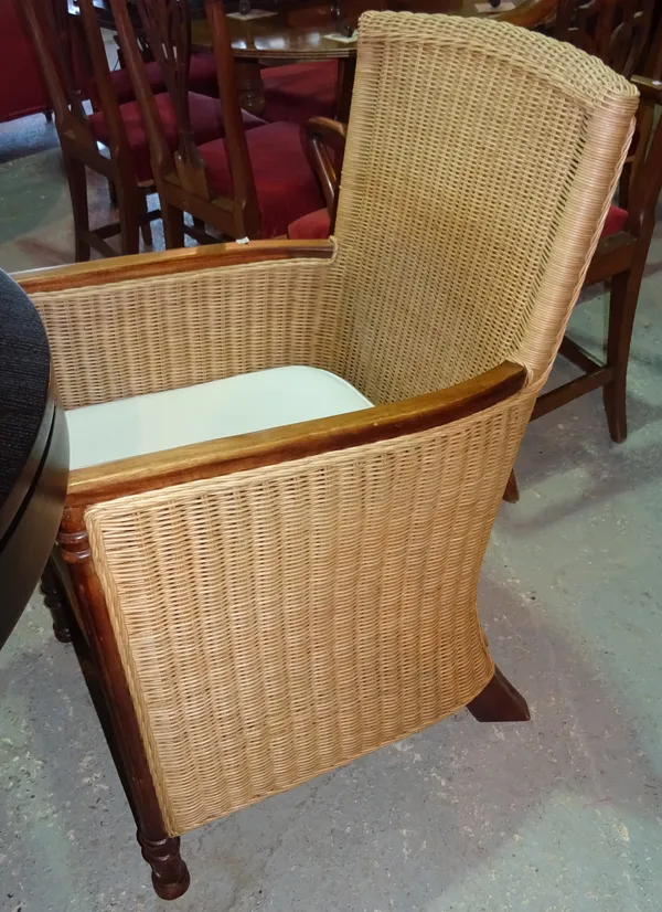 A set of three 20th century mahogany framed rattan armchairs on fluted supports, 56cm wide, and one further similar, (4)  B6