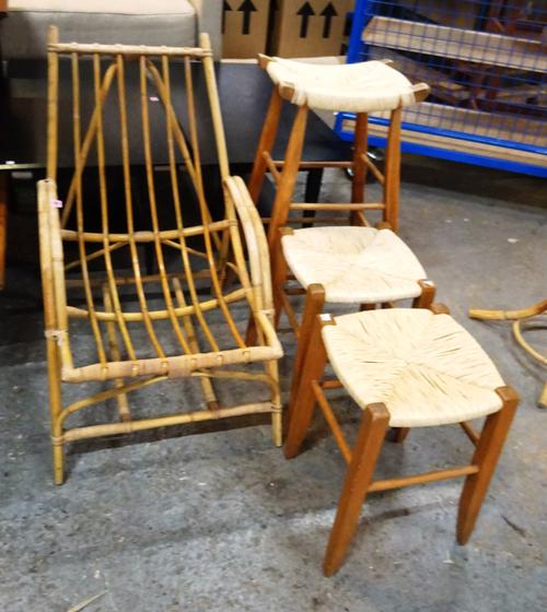 Angraves; a 20th century bamboo low open armchair, a 20th century stained pine bar stool and two matching low stools all with wicker seats, (4).  EXTR