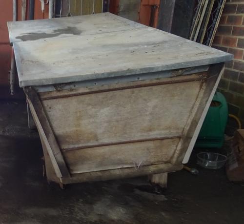 A late 19th elm dough bin with later added zinc lining on trestle end supports, 193cm wide x 72cm high.  OUT
