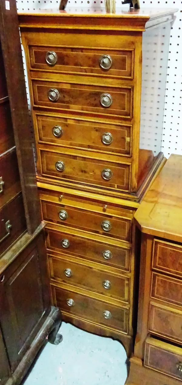 A 20th century yew wood collector's chest on chest with eight graduated drawers, 40cm wide x 123cm high. G10
